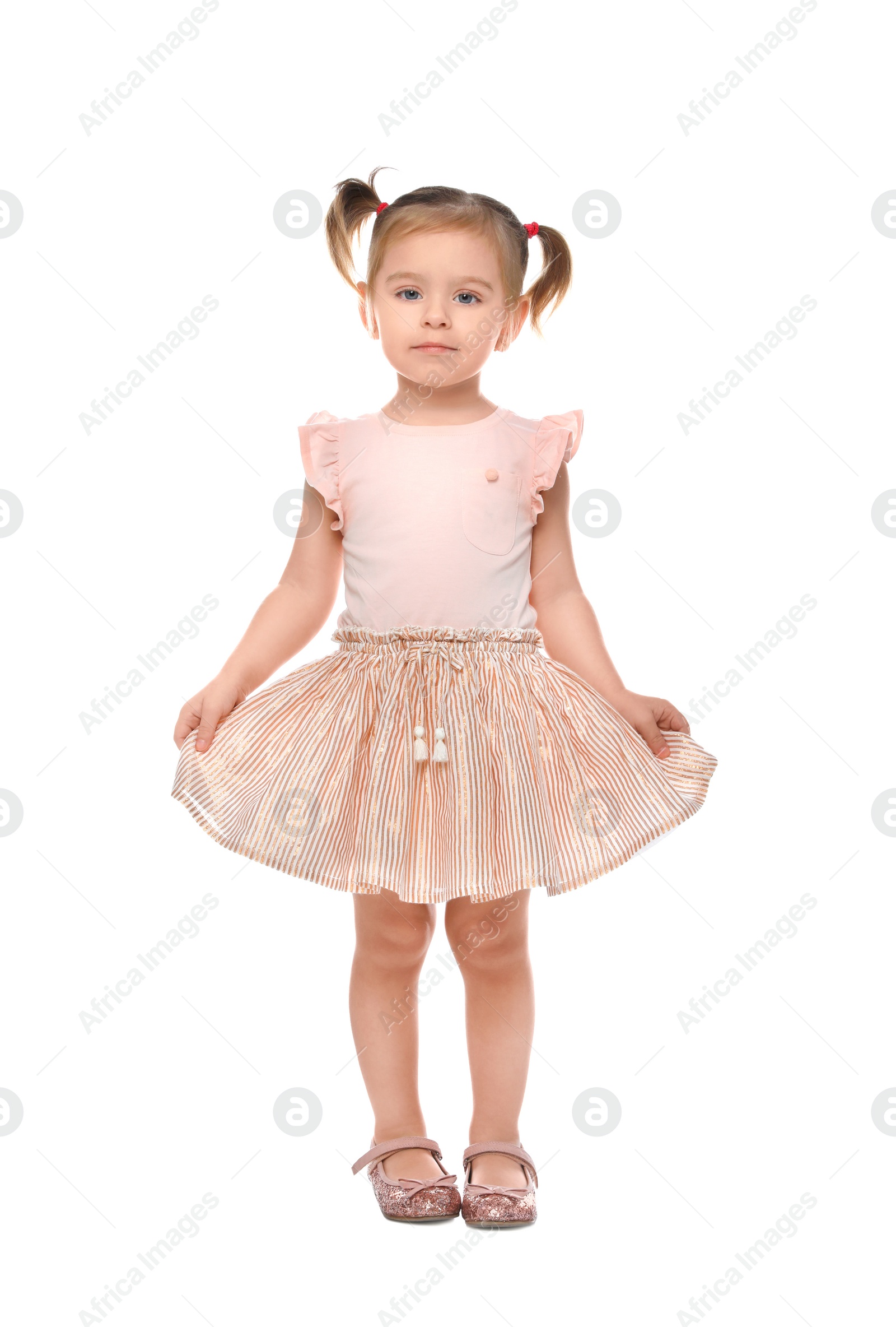 Photo of Little girl in cute clothes on white background