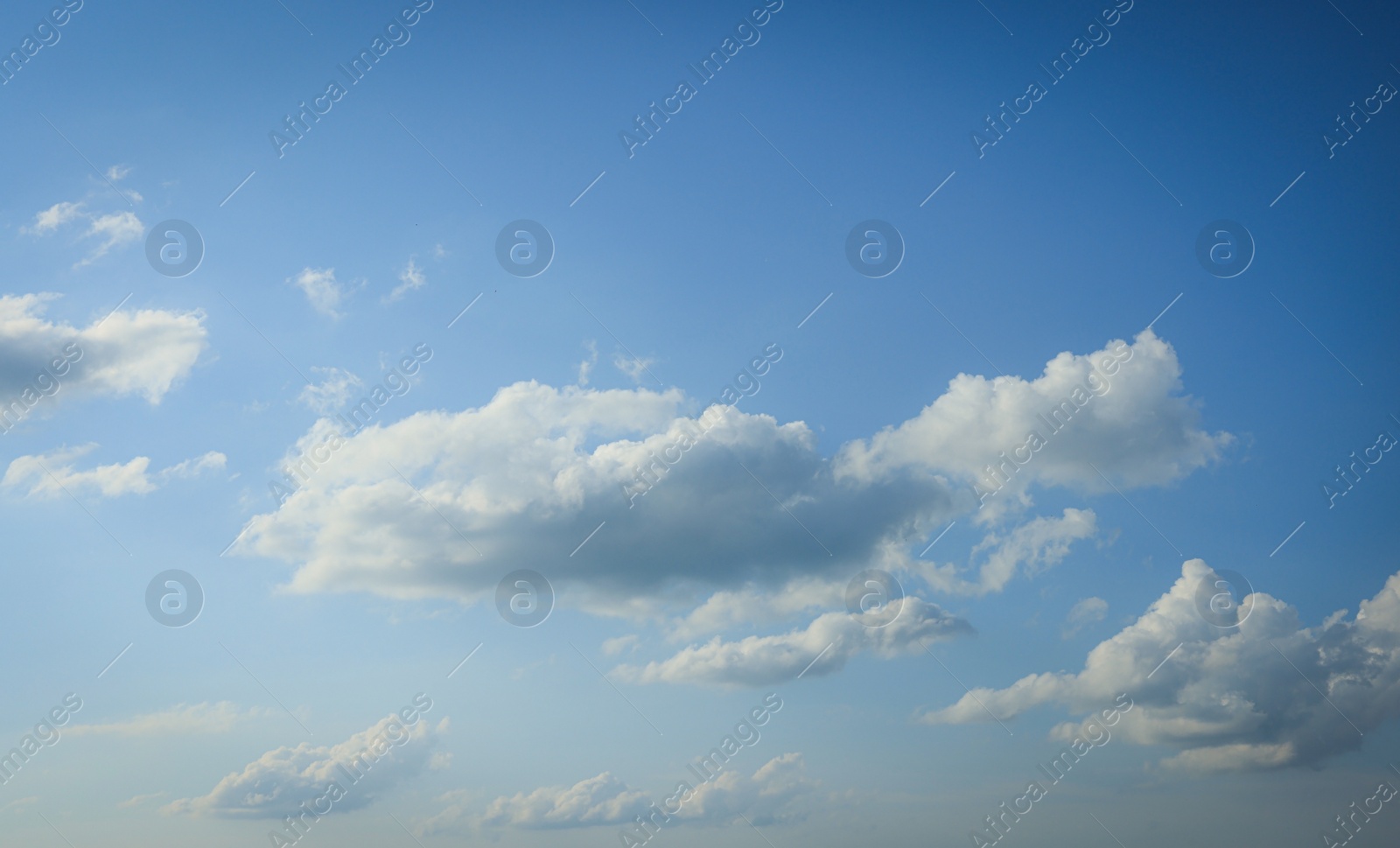 Photo of Beautiful blue sky with fluffy white clouds