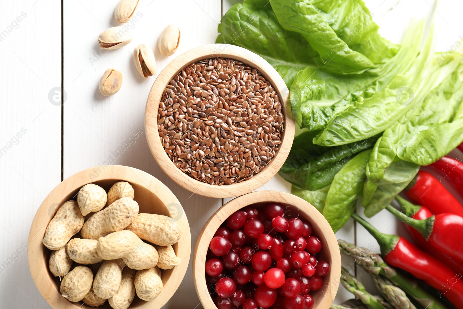 Photo of Many different healthy food on white wooden table, flat lay