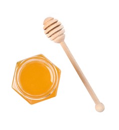 Tasty honey in glass jar and dipper isolated on white, top view