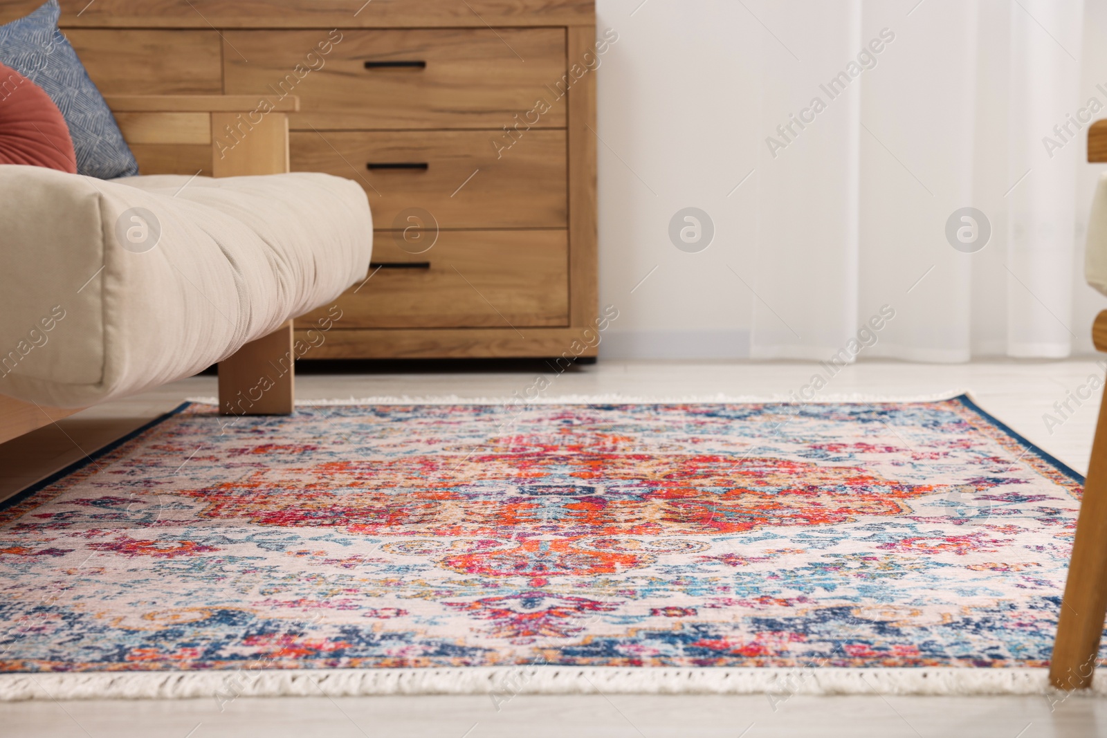 Photo of Beautiful rug on floor in living room, low angle view
