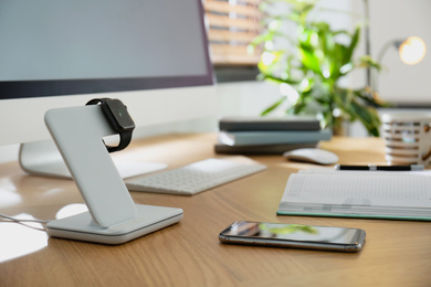 Modern workplace and watch charging with wireless pad