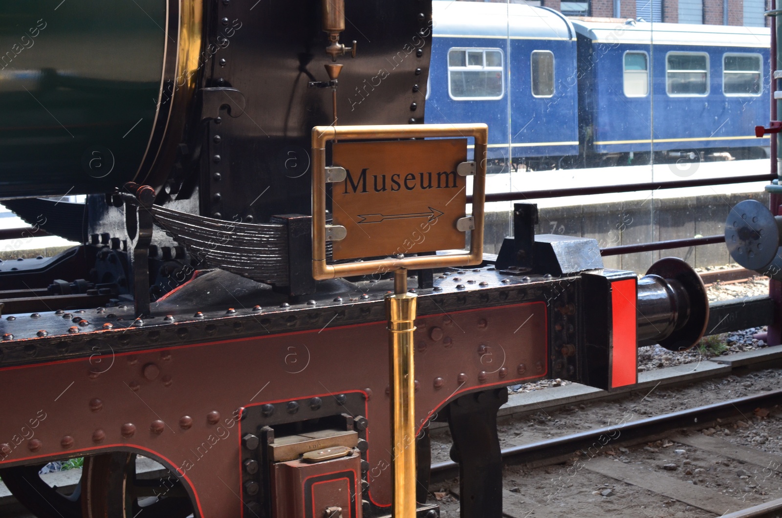 Photo of Utrecht, Netherlands - July 23, 2022: Spoorwegmuseum. Museum sign and arrow at railway station