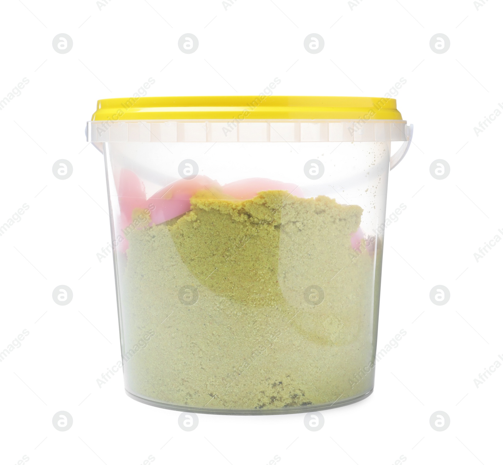 Photo of Kinetic sand and toy in bucket isolated on white