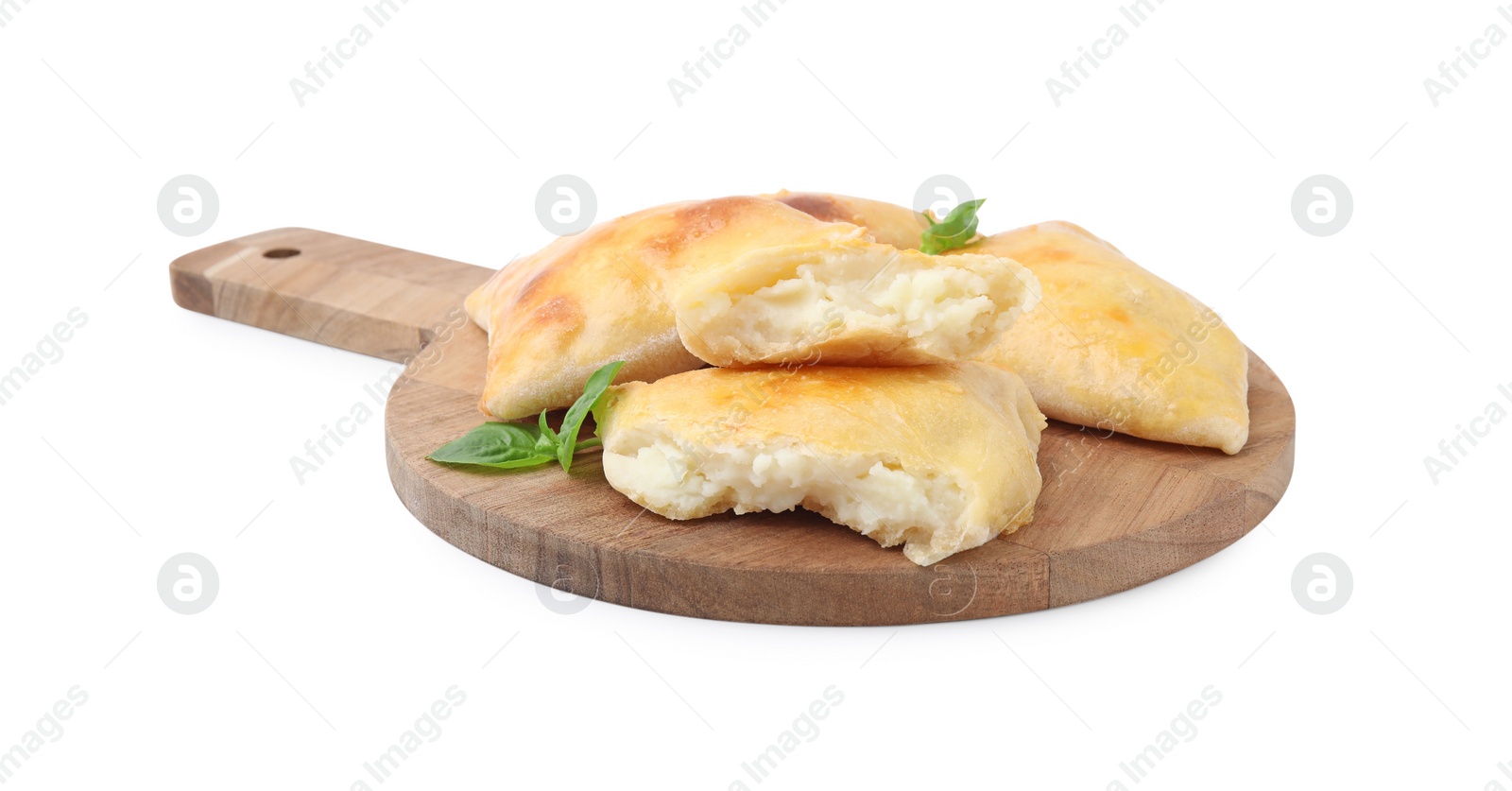 Photo of Wooden board with delicious samosas and basil isolated on white