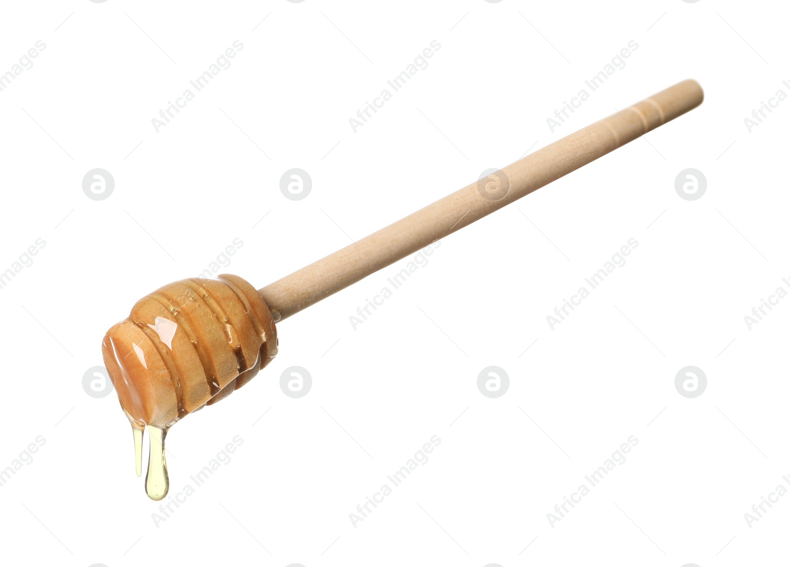 Photo of Natural honey dripping from dipper on white background