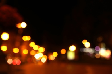 Blurred view of beautiful city at night. Bokeh effect