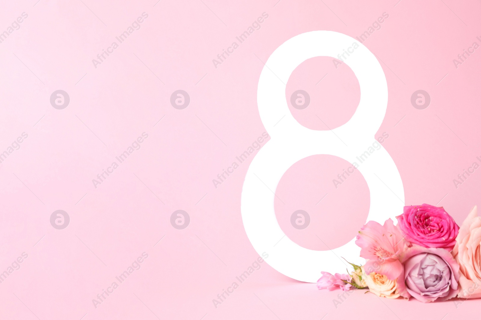 Photo of 8 March greeting card design with beautiful flowers on light pink background. Space for text