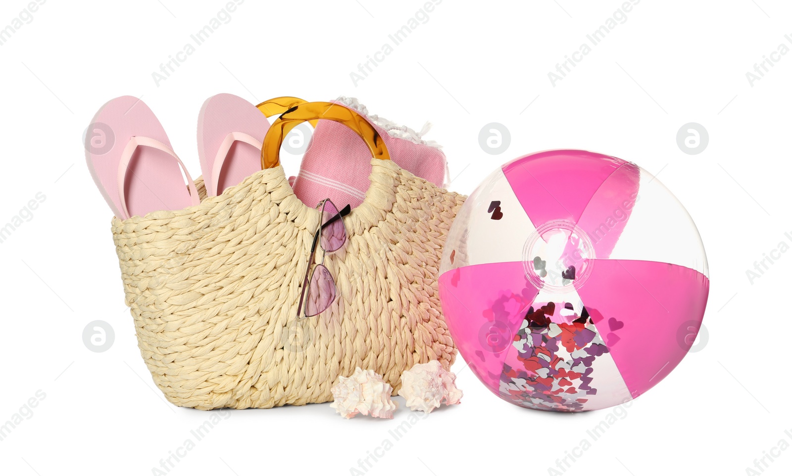 Photo of Inflatable ball and beach accessories on white background