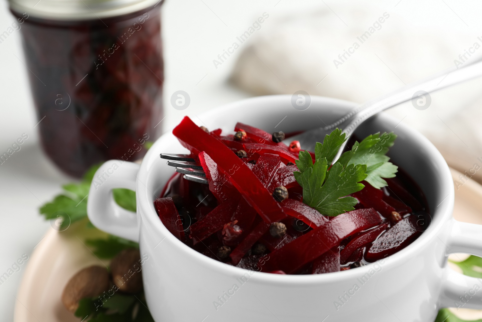 Photo of Delicious pickled beets on table, closeup view