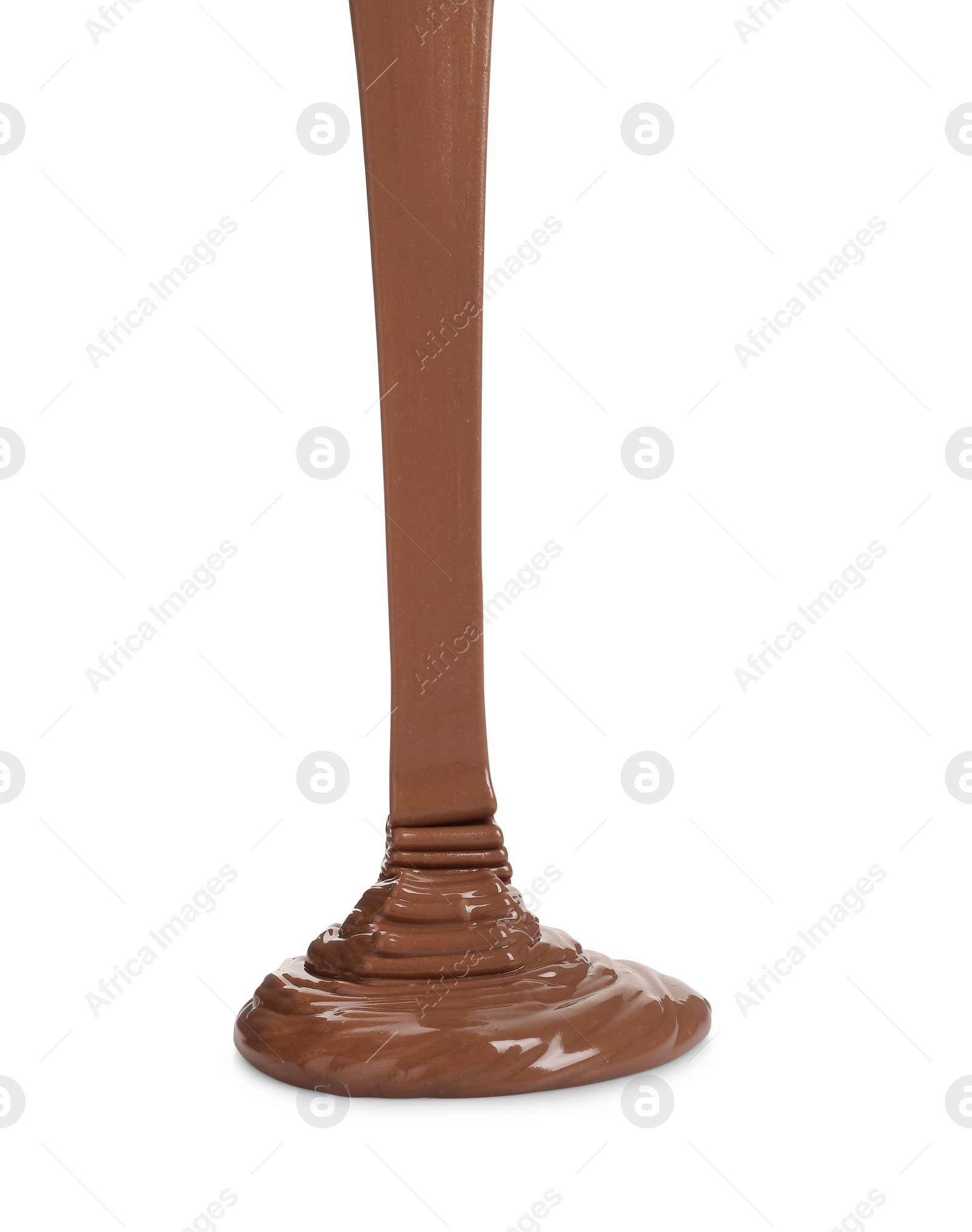 Photo of Pouring tasty melted milk chocolate isolated on white