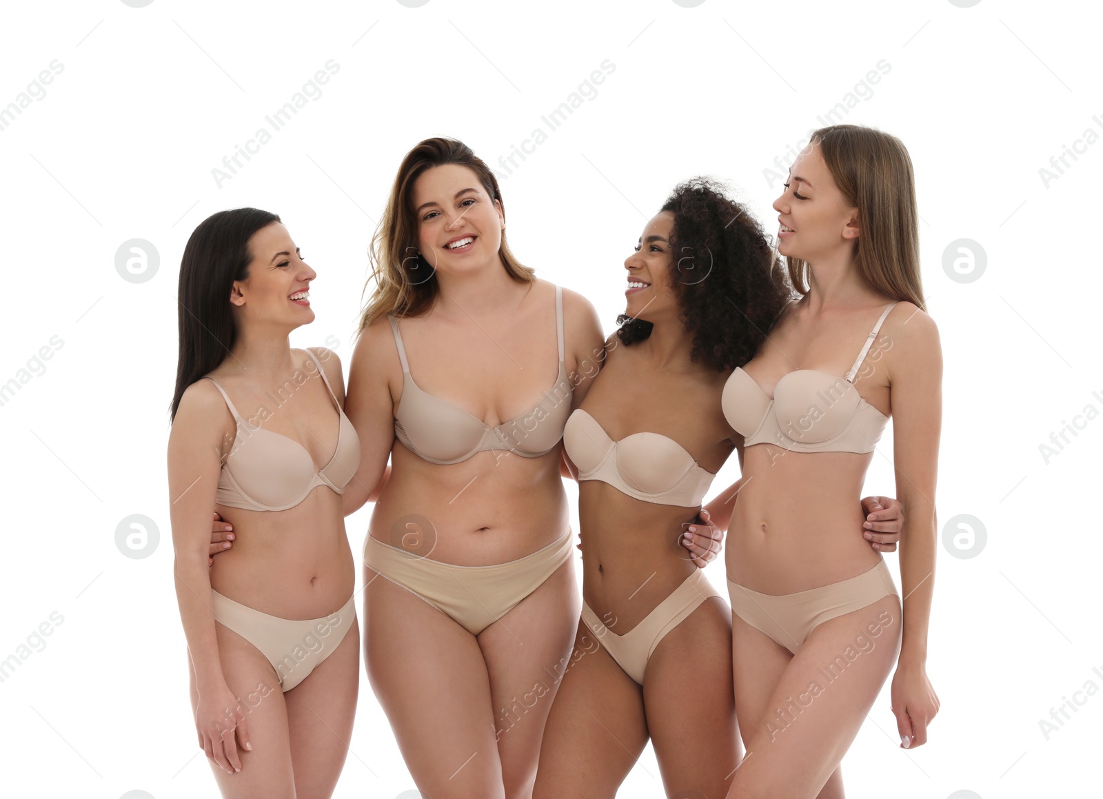 Photo of Group of women with different body types in underwear on white background