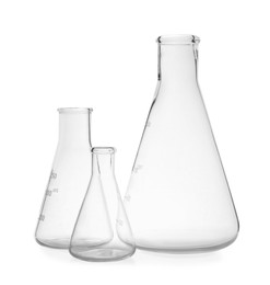 Photo of Empty flasks on white background. Laboratory equipment