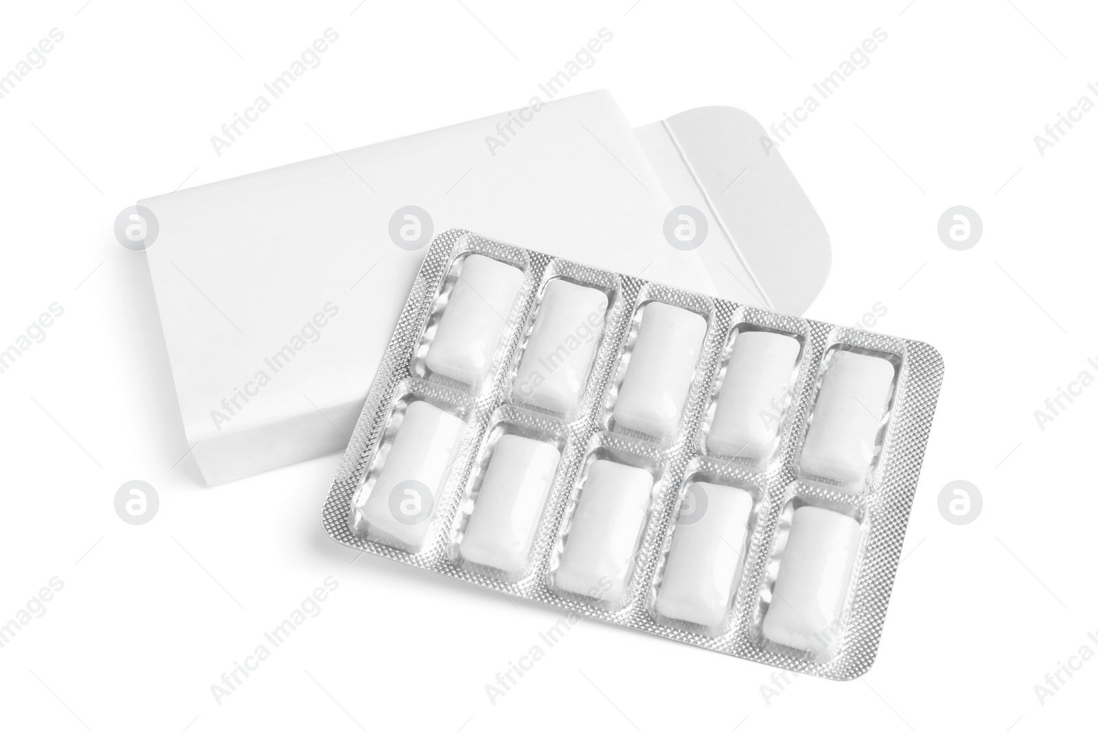 Photo of Pack and blister with chewing gums isolated on white