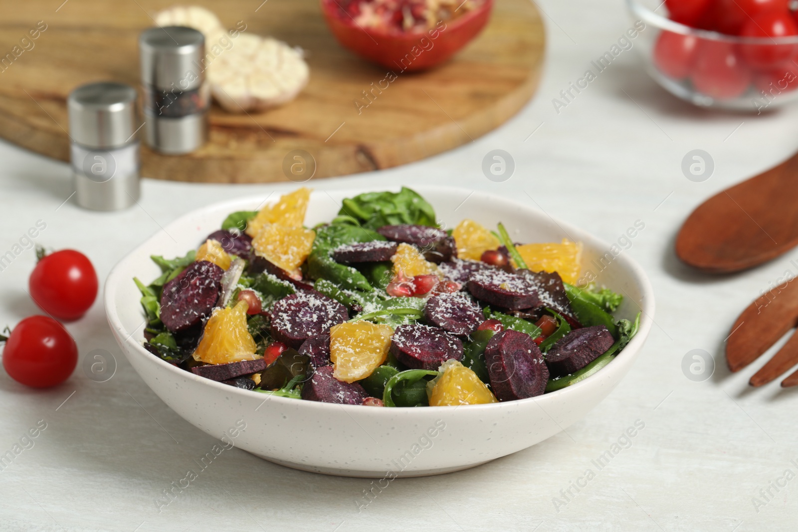 Photo of Delicious fresh carrot salad served on white table