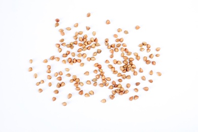 Uncooked buckwheat on white background, top view