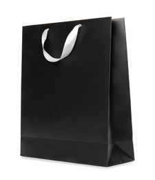 Photo of Paper shopping bag isolated on white. Mock up for design