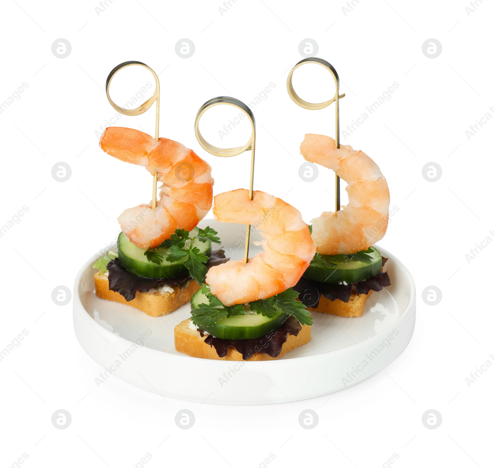 Photo of Tasty canapes with shrimps, greens and cucumber isolated on white