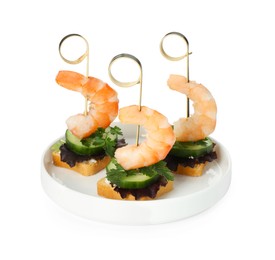 Tasty canapes with shrimps, greens and cucumber isolated on white