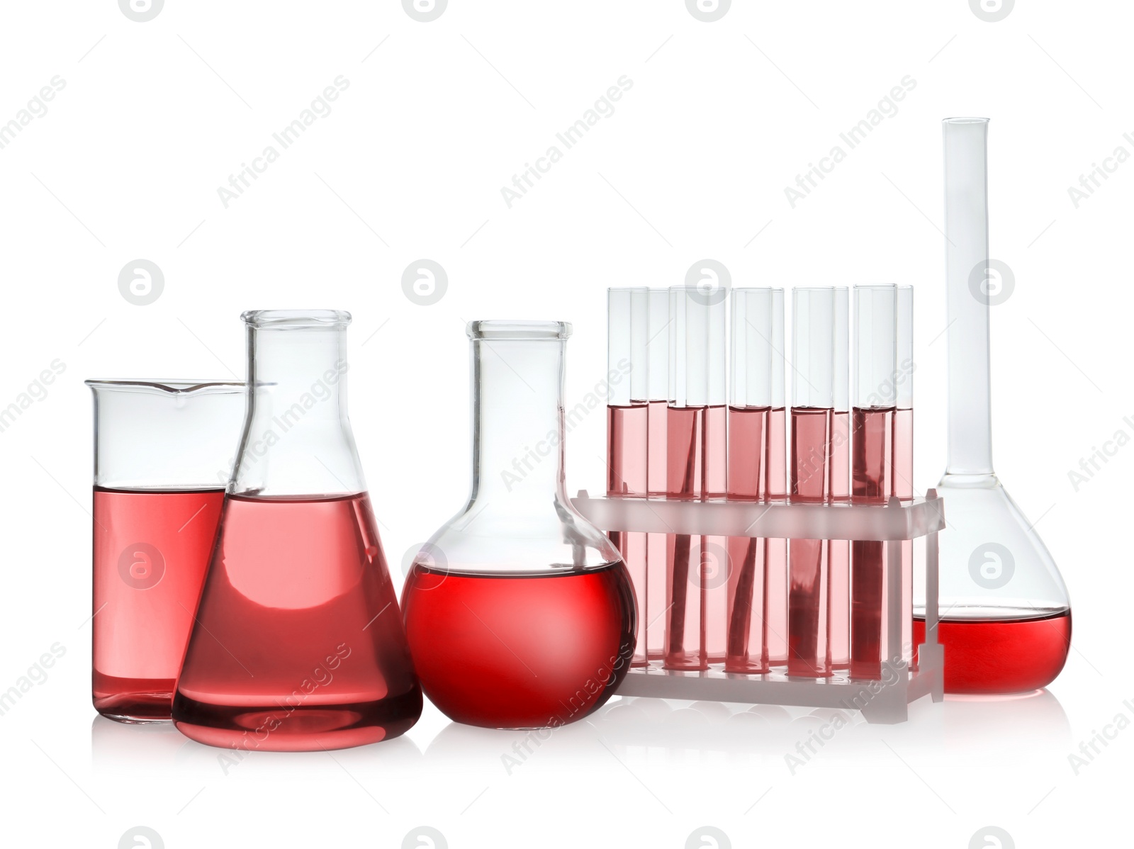 Image of Laboratory glassware with red liquid isolated on white