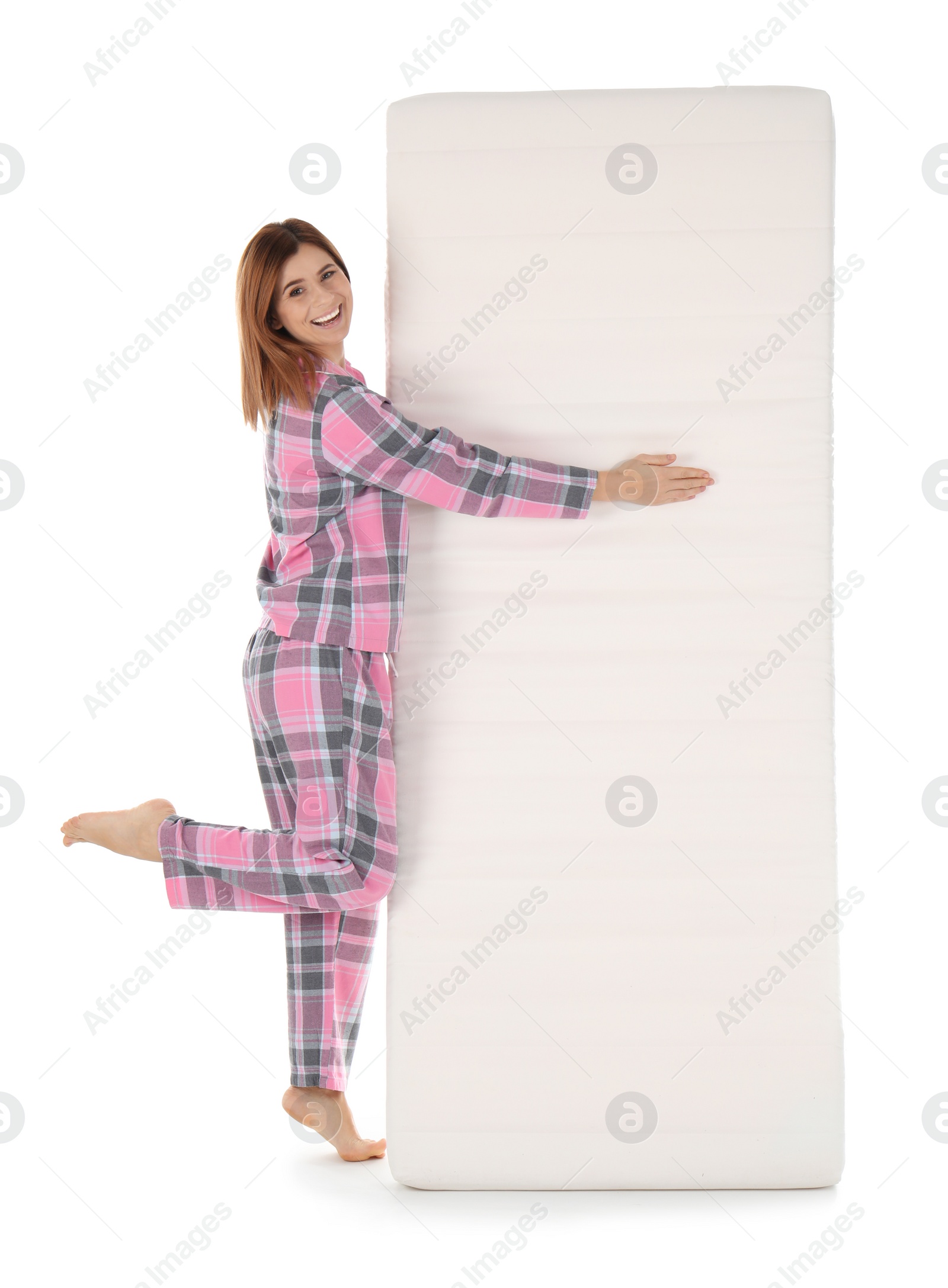 Photo of Woman with comfortable mattress isolated on white