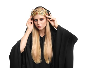 Photo of Witch in black mantle and crown isolated on white. Scary fantasy character