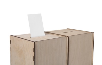 Photo of Wooden ballot boxes with vote isolated on white