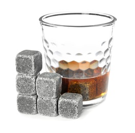 Glass with liquor and whiskey stones on white background