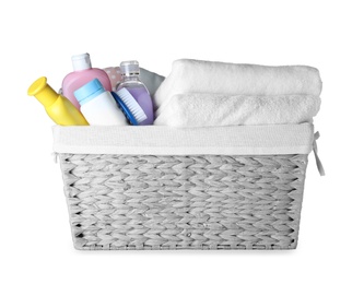 Basket with different baby accessories isolated on white