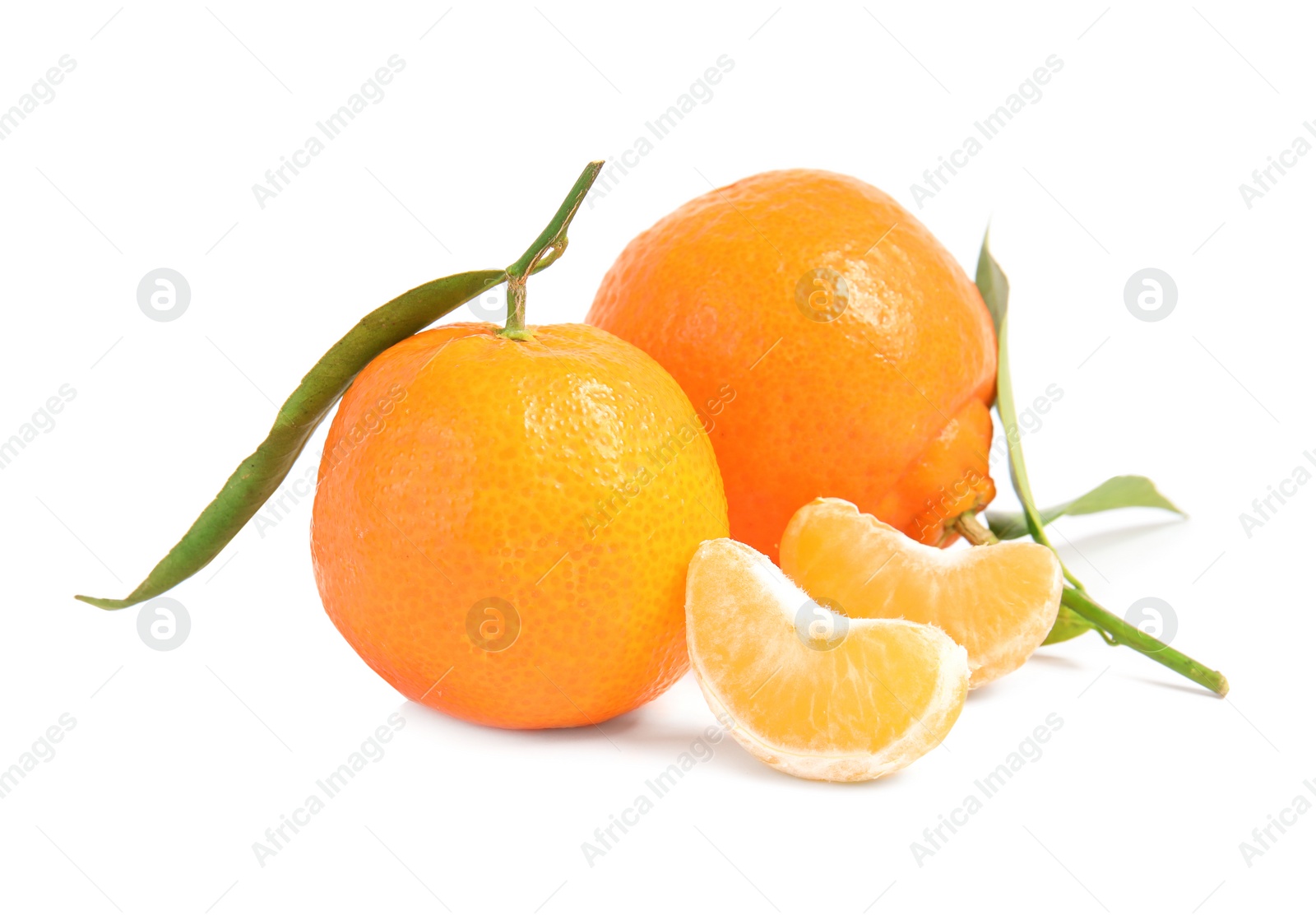 Photo of Tasty ripe tangerines with leaves on white background