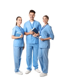 Group of young medical students on white background