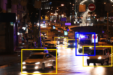 Night city road with scanner frames on cars. Machine learning