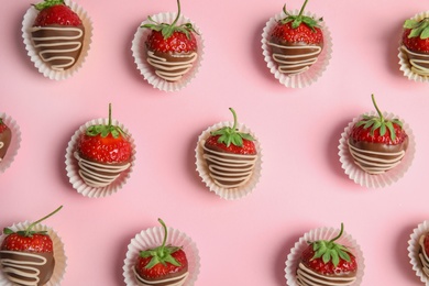 Photo of Flat lay composition with chocolate covered strawberries on color background