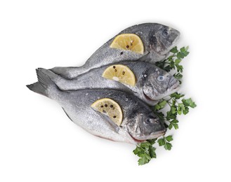 Photo of Raw dorado fish, parsley, lemon slices and peppercorns isolated on white, top view