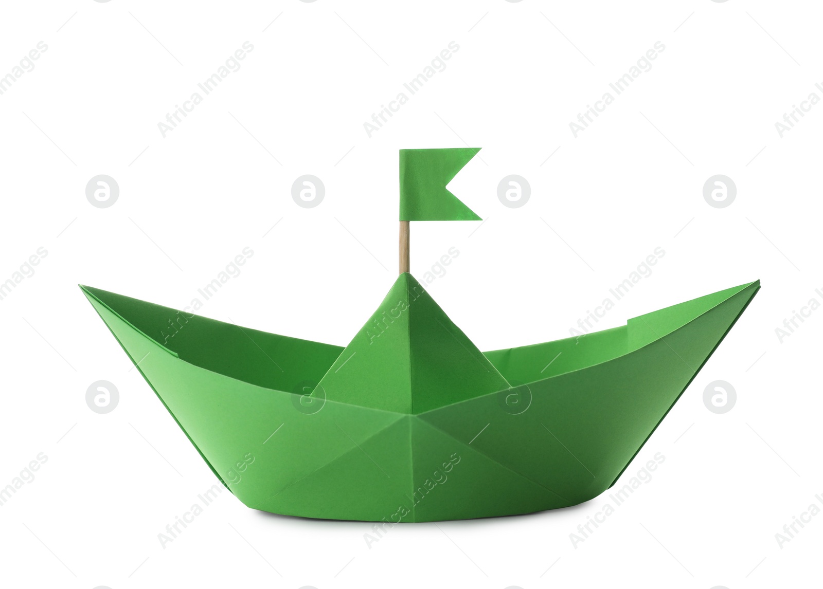 Photo of Handmade green paper boat with flag isolated on white. Origami art