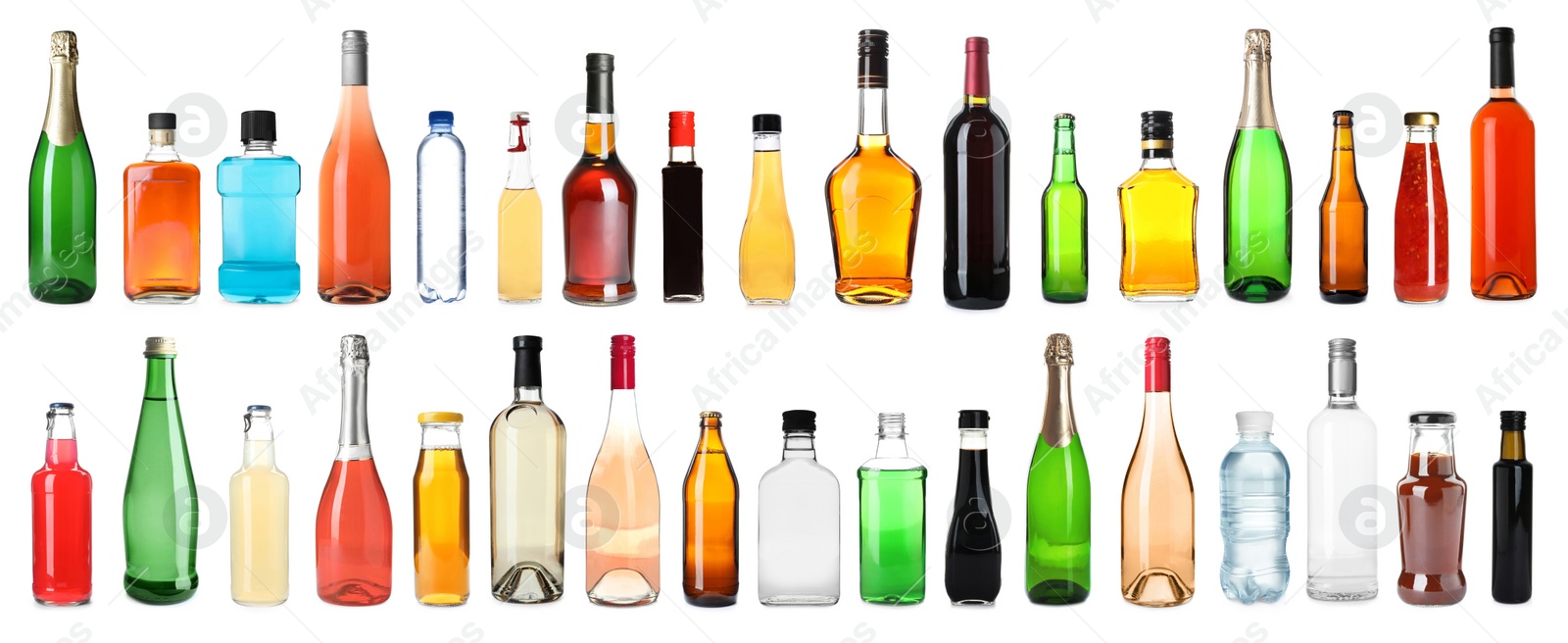 Image of Set of bottles with different liquids on white background. Banner design