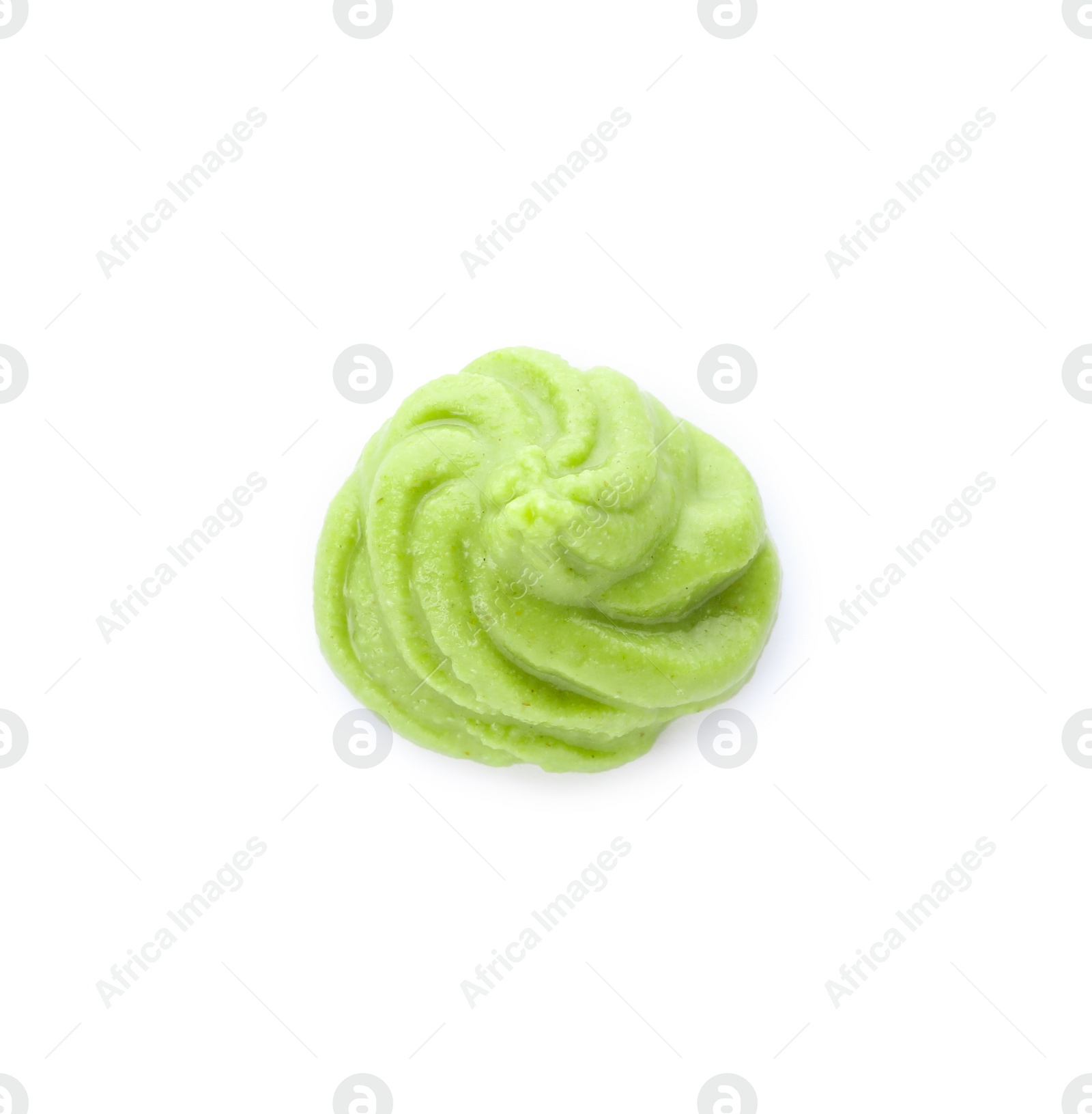 Photo of Swirl of delicious spicy wasabi paste isolated on white, top view