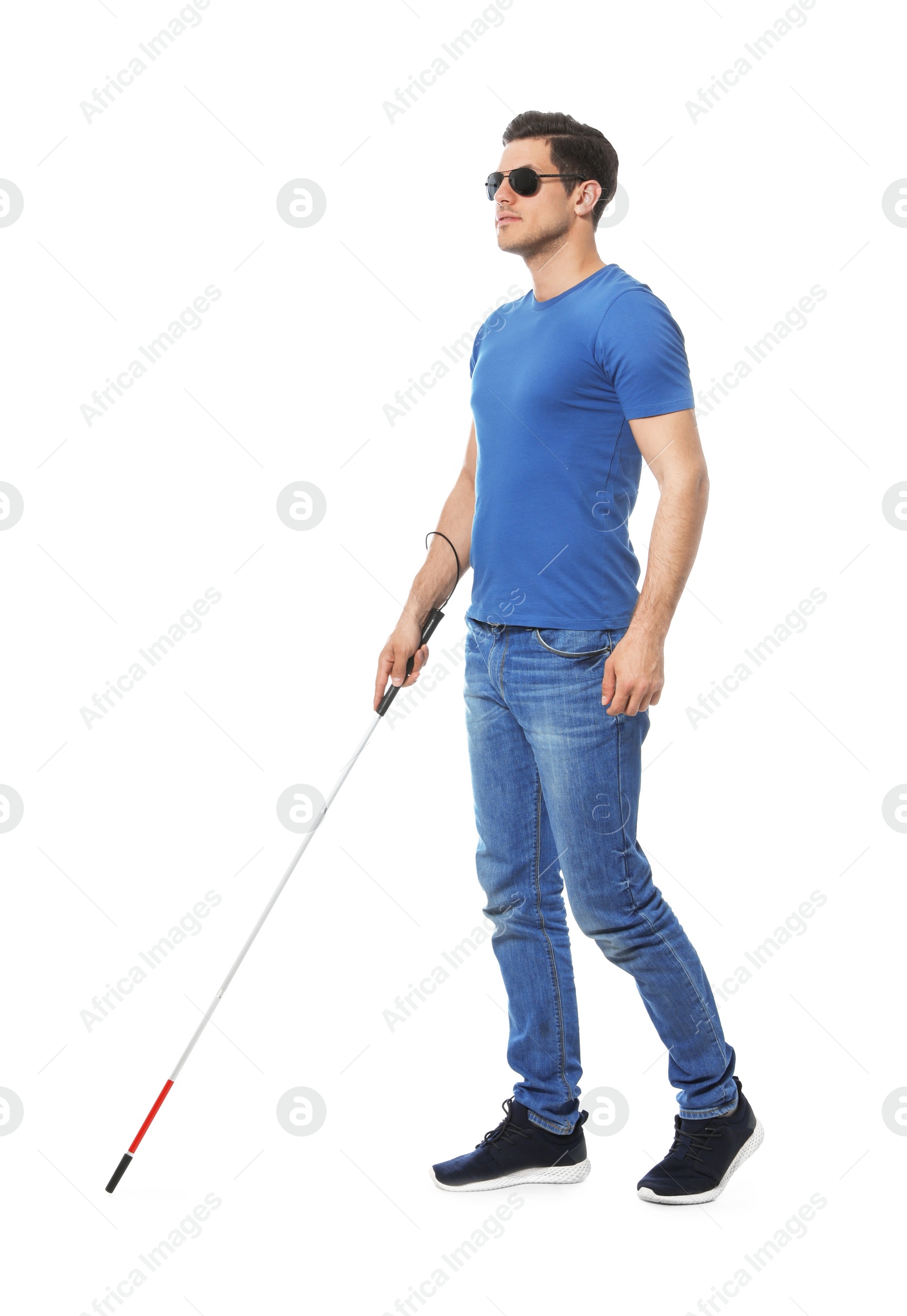 Photo of Blind man with long cane on white background