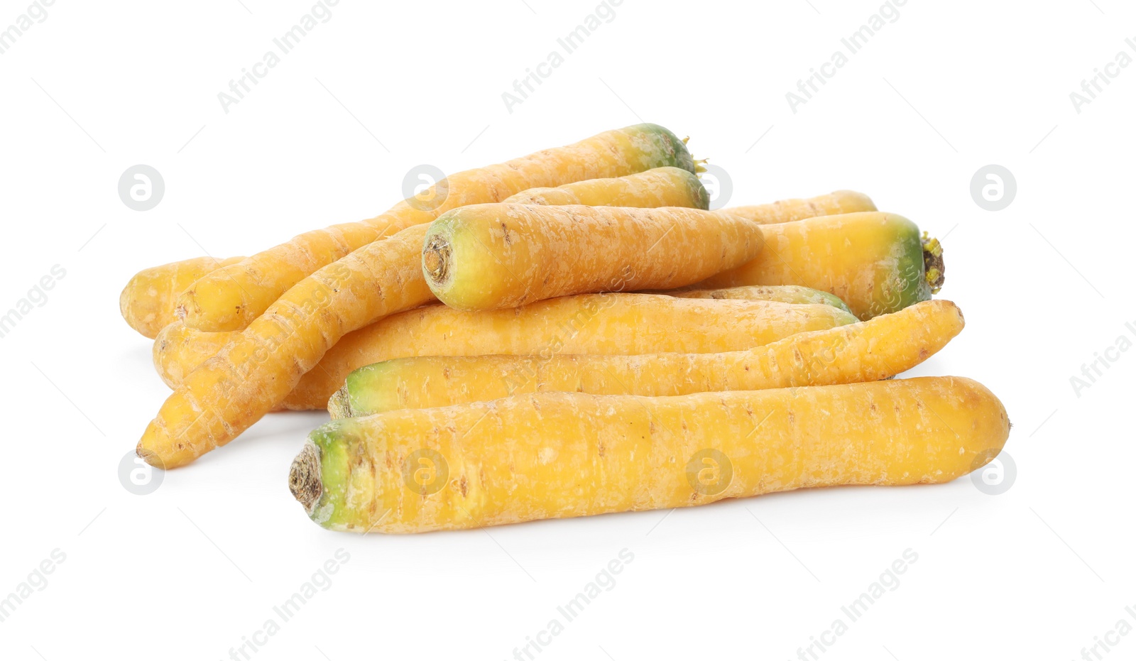 Photo of Fresh raw yellow carrots isolated on white