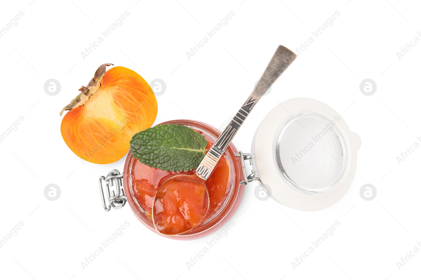 Photo of Jar and spoon of tasty persimmon jam with mint, fresh fruit on white background, top view