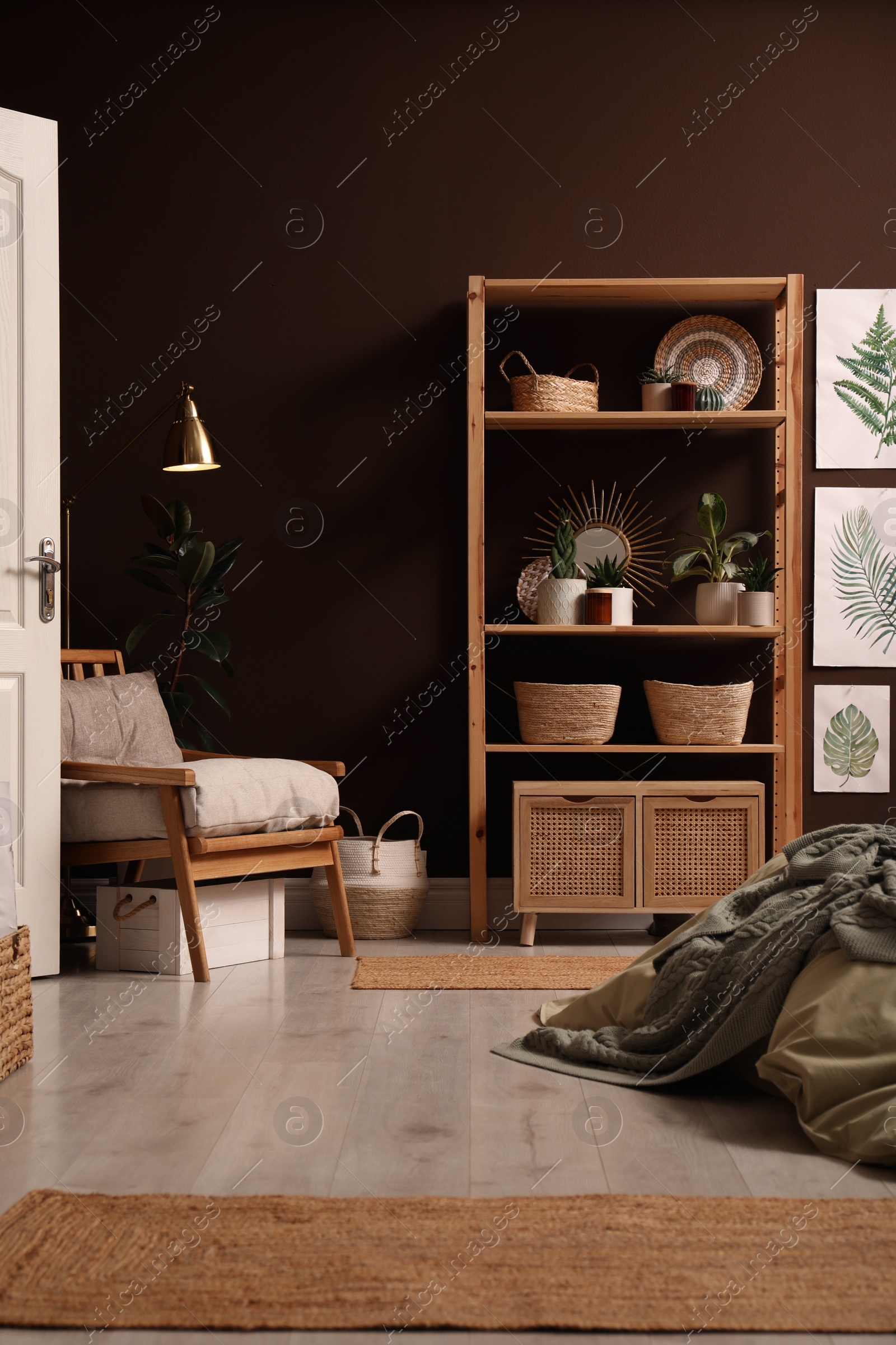 Photo of Interior of modern bedroom with wooden furniture