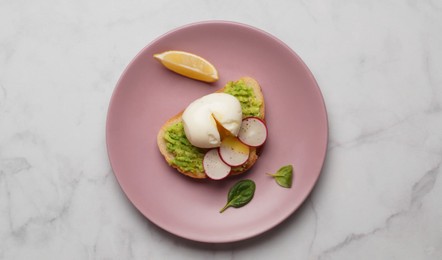 Delicious sandwich with boiled egg on white marble table, flat lay