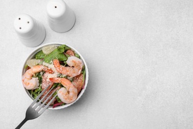 Photo of Delicious salad with pomelo, shrimps and tomatoes on white table, flat lay. Space for text