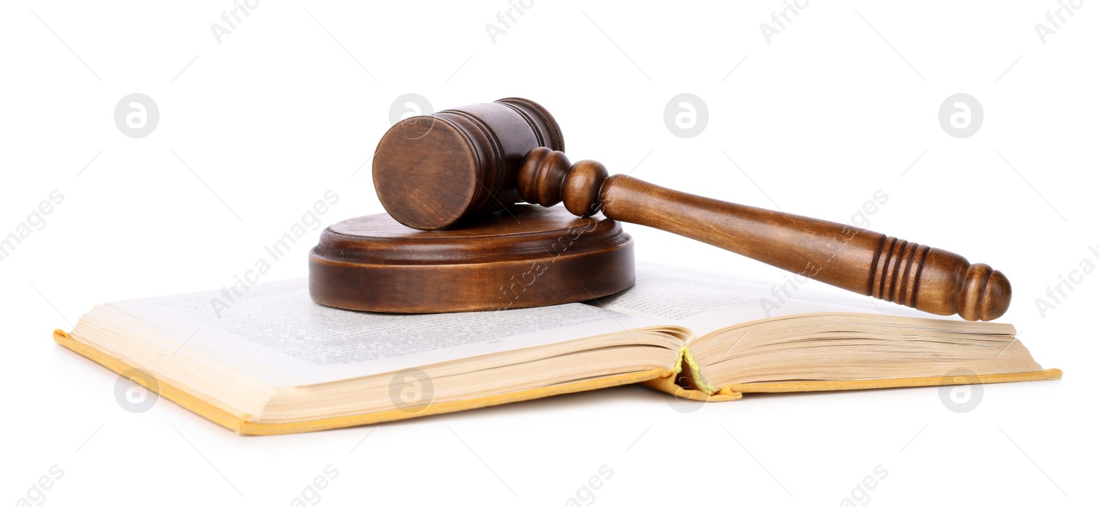 Photo of Wooden gavel and open book on white background