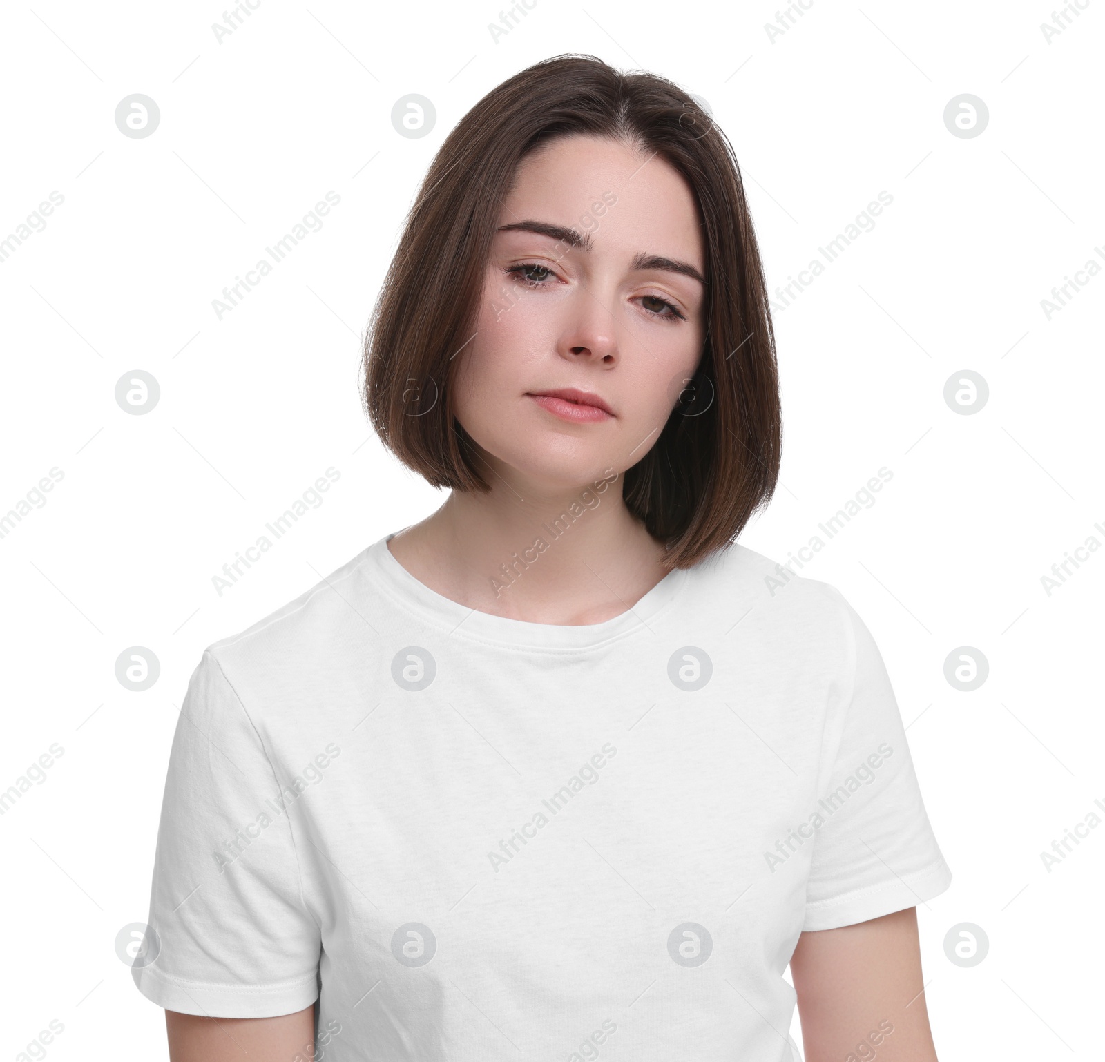 Photo of Unhappy young woman on white background. Insomnia problem