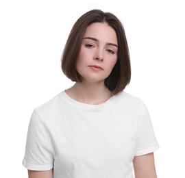 Photo of Unhappy young woman on white background. Insomnia problem