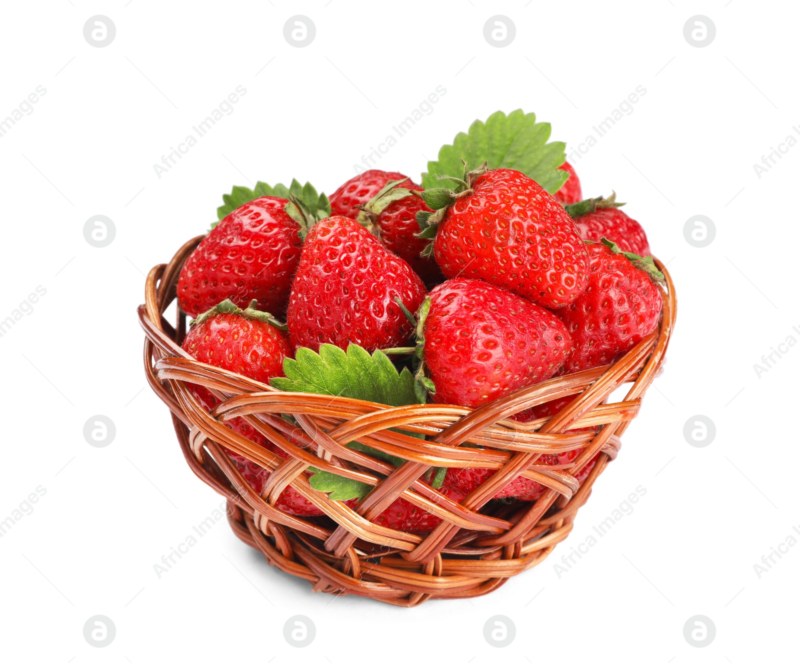 Photo of Fresh ripe red strawberries in wicker basket isolated on white