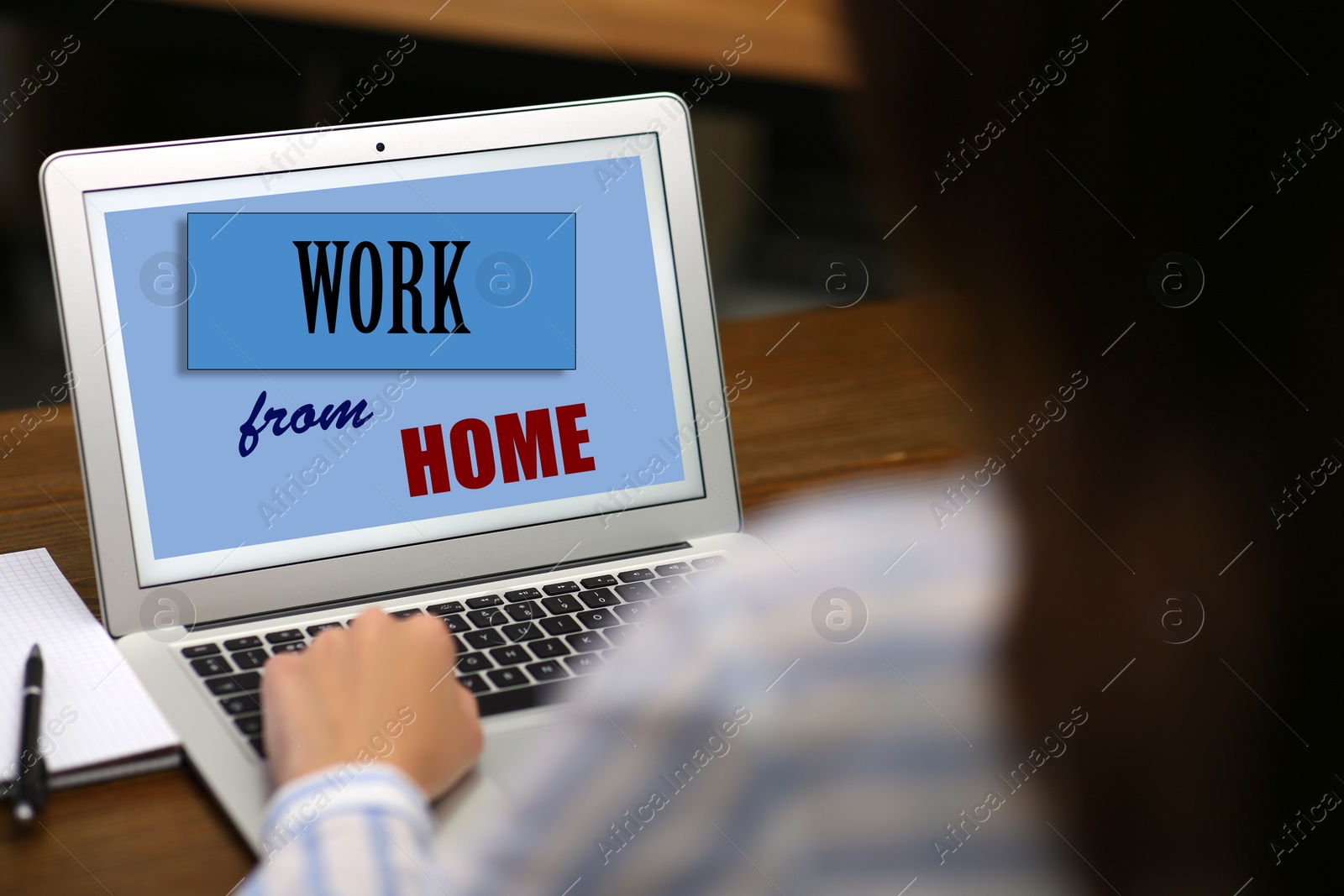 Image of Woman using modern laptop at table, closeup. Work from home