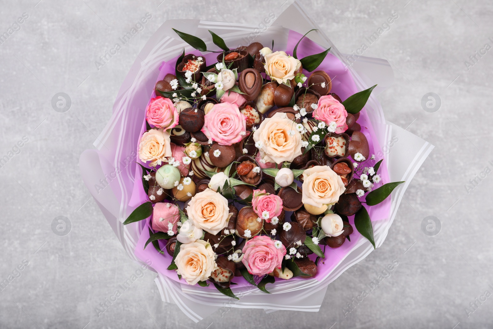 Photo of Beautiful food bouquet on light grey table, top view