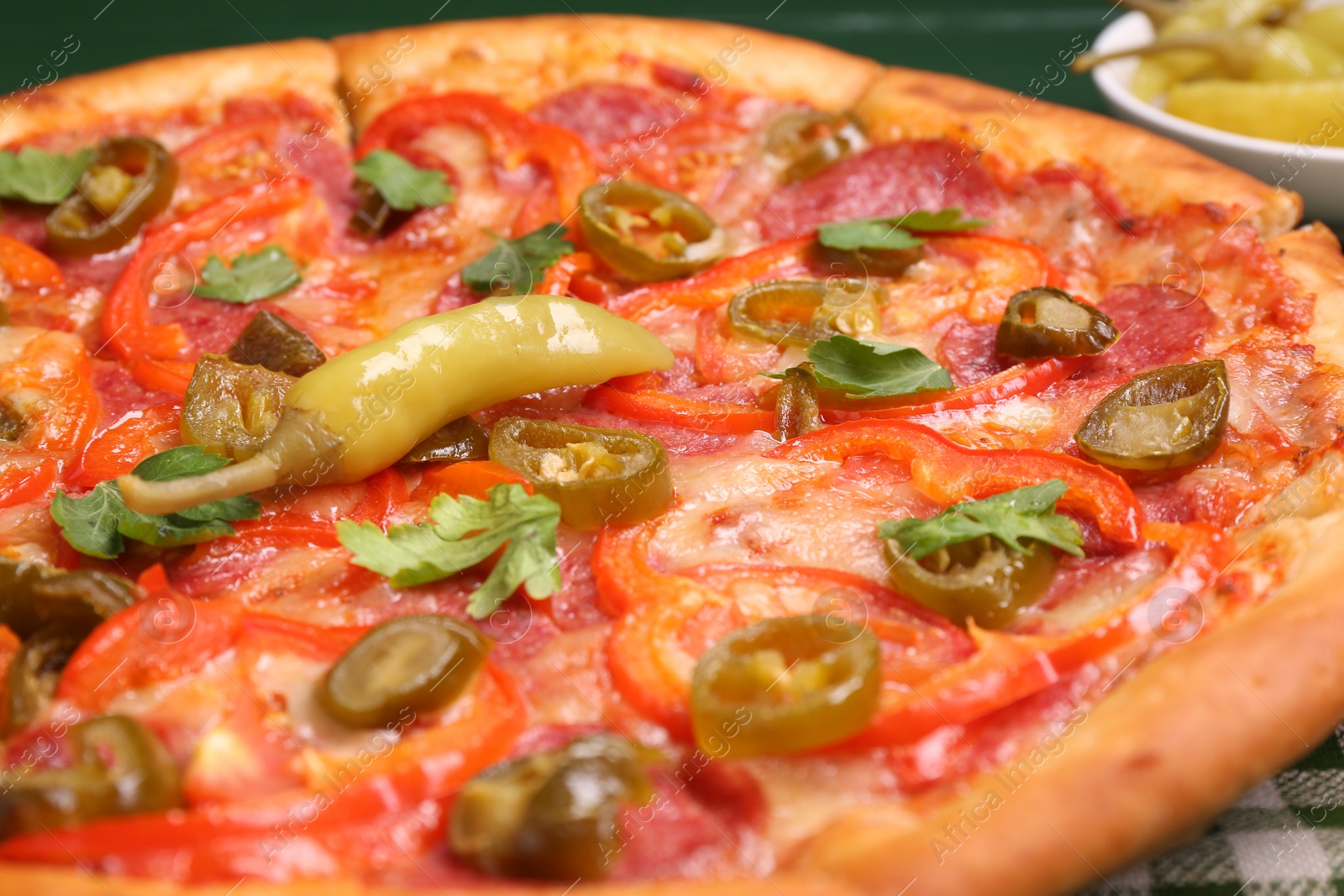 Photo of Delicious hot pizza Diablo on table, closeup